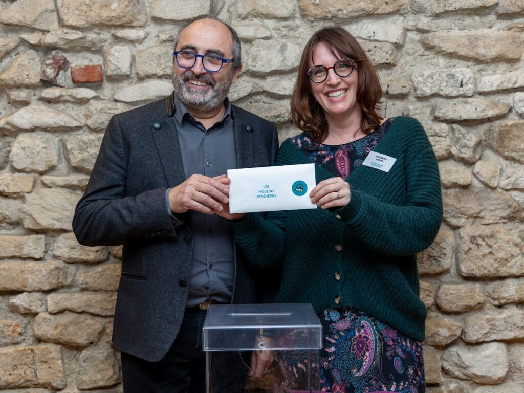 Photo de collaborateurs Moulins Pyrénéens montrant leur engagement dans la capsule temporelle de l'alimentation
